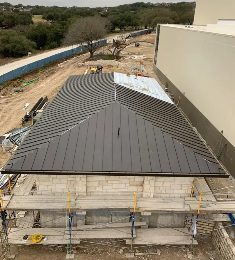 Metal roof new construction with scaffolding in Litchfield Beach